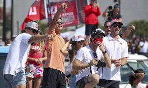 Tom Brady tosses Lombardi Trophy over water during Super Bowl parade
