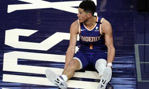 Suns' Devin Booker to miss All-Star Sunday due to left knee sprain