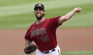D-backs' Bumgarner strikes out 7, gives up 6 ER in 3rd spring start