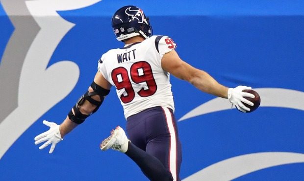 J.J. Watt #99 of the Houston Texans returns an interception for a touchdown during the first half a...