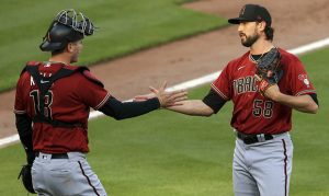 Diamondbacks hold off Reds to finish suspended game