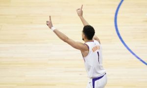 Suns' Devin Booker emphatically shuts door on 76ers after early struggles