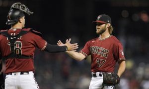 D-backs option 'growing' RHP Matt Peacock, starter Zac Gallen recalled