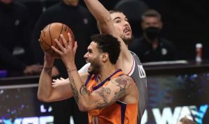 Suns' Abdel Nader sees game action after knee surgery
