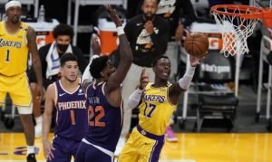 Suns' Devin Booker, Chris Paul proud of Deandre Ayton's postseason leap