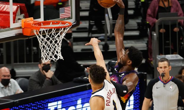 PHOENIX, ARIZONA - JUNE 07: Deandre Ayton #22 of the Phoenix Suns slam dunks the ball against Micha...
