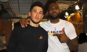 LeBron James gives Devin Booker jersey signed 'continue to be great'