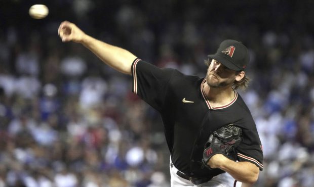 Arizona Diamondbacks pitcher Matt Peacock throws against the Los Angeles Dodgers in the first innin...