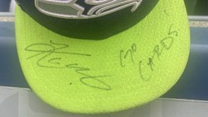 Kyler Murray signs Seahawk fan's hat, but not before writing 'Go Cards!'