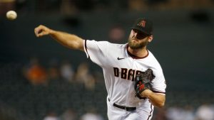 D-backs trade RHP Matt Peacock to Royals for cash considerations
