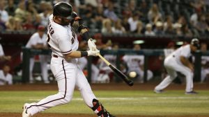 Watch: D-backs' Christian Walker hits moonshot, flashes leather vs. Reds