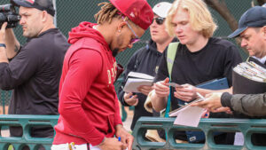 When will the Diamondbacks, other Cactus League teams report to spring training?