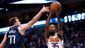 Duel of dual superstars sees Suns edge Mavericks in afternoon thriller
