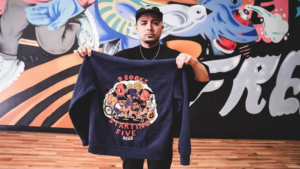 Phoenix street artist, Suns Charities create Devin Booker 'Starting Five' hoodie