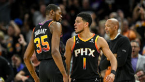 Booker, Durant carry Suns to required victory over Nuggets