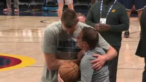 Nuggets' Nikola Jokic daps up Suns owner Mat Ishbia prior to Game 5