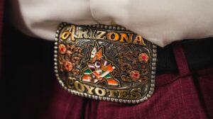 Coyotes match with maroon suits, Arizona belt buckles for NHL Draft