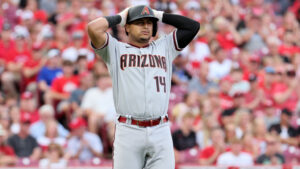 Reds turn Diamondbacks mistakes into runs, take series opener at home