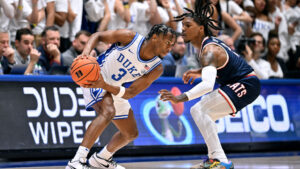 No. 12 Arizona's Caleb Love banks in deep buzzer-beater 3 to end 1st half at No. 2 Duke