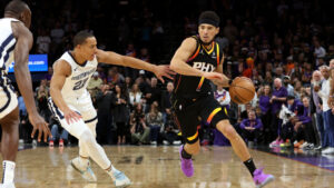 Suns use 14-0 run featuring Devin Booker crossover to pull away from Grizzlies