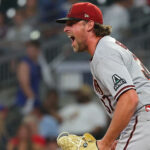 Kevin Ginkel #37 of the Arizona Diamondbacks reacts after their 16-13 win over the Atlanta Braves at Truist Park on July 18, 2023 in Atlanta, Georgia. (Photo by Kevin C. Cox/Getty Images)