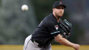 Diamondbacks place starter Merrill Kelly on injured list, recall Tommy Henry