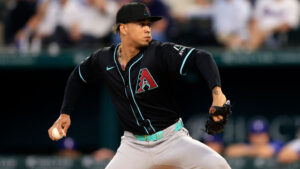 Diamondbacks' Justin Martinez steps up with his parents watching for the 1st time
