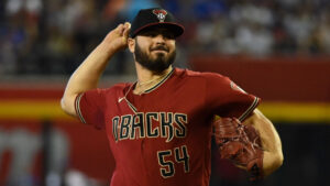 Diamondbacks recall Humberto Castellanos, option Scott McGough