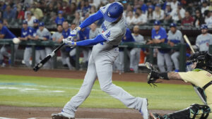 Dodgers get best of Diamondbacks pitching in wild series opener