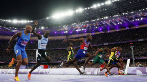 Noah Lyles pulls out Olympic 100 by five-thousandths of a second in photo finish