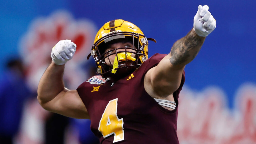 ASU's Cam Skattebo celebrates midgame at the Peach Bowl...