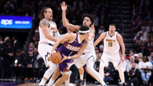 Shorthanded Suns hit wall offensively in loss to Nuggets