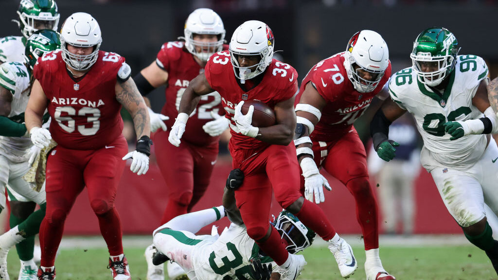 Arizona Cardinals RB Trey Benson runs the rock...