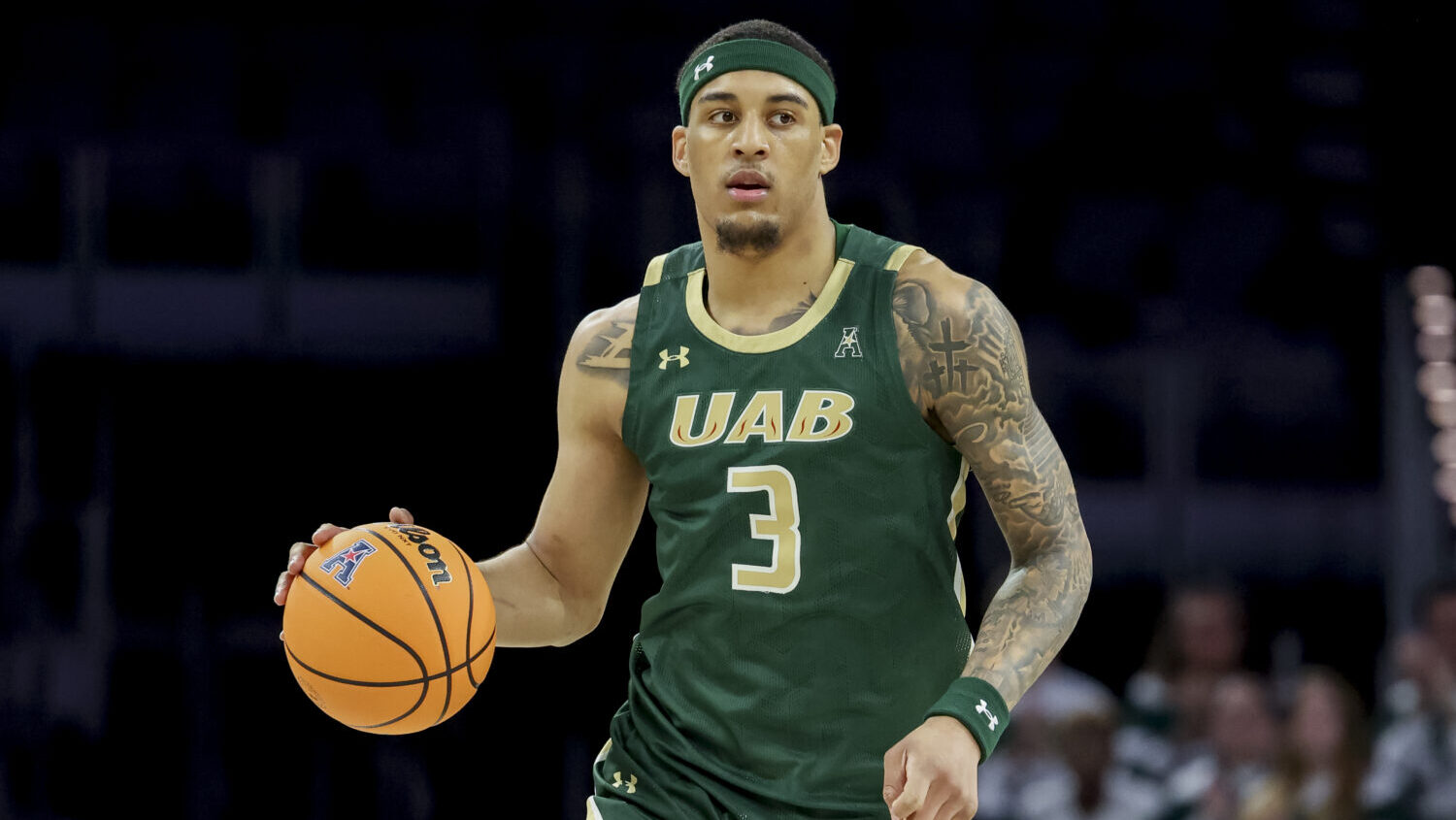 UAB forward Yaxel Lendeborg (3) brings the ball down court during the first half of an NCAA college...