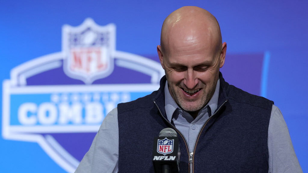 Cardinals GM Monti Ossenfort smiles during the NFL Draft Combine...
