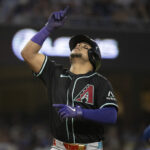 Arizona Diamondbacks' Gabriel Moreno celebrates after his two-run home run during the third inning of a baseball game against the Los Angeles Dodgers in Los Angeles, Monday, May 19, 2025. (AP Photo/Kyusung Gong)