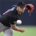 Arizona Diamondbacks starting pitcher Brandon Pfaadt works against a San Diego Padres batter during the first inning of a baseball game Wednesday, July 9, 2025, in San Diego. (AP Photo/Orlando Ramirez)