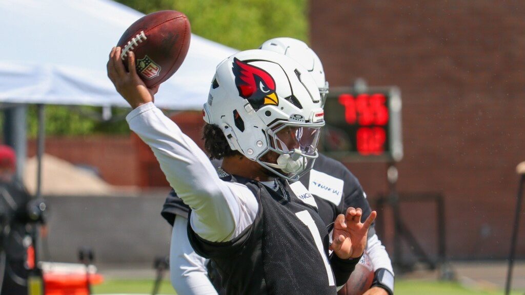 Kyler Murray looks to pass during minicamp. The QB is being viewed as a top 10 signal caller for fa...