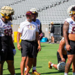 Arizona State DL C.J. Fite (99) and Justin Wodtly (95) with DL coach Diron Reynolds at fall camp practice on Aug. 5, 2025. (Damon Allred/Arizona Sports)