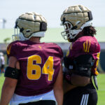 Arizona State Wade Helton (64) and Max Iheanachor (right) at a fall camp practice on Aug. 15, 2025. (Damon Allred/Arizona Sports)