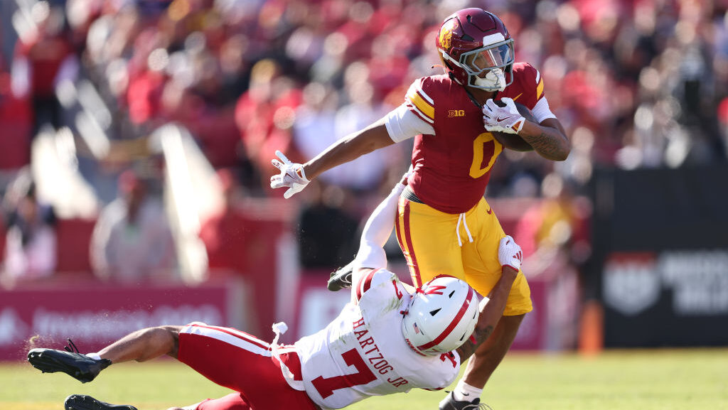 Quinten Joyner #0 of the USC Trojans runs past the defense of Malcolm Hartzog Jr. #7 of the Nebrask...