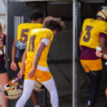ASU football staff members with cowbells at practice on Sept. 2, 2025, as the Sun Devils prepare for a game at Mississippi State. (Damon Allred/Arizona Sports)