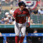 Arizona Diamondbacks' James McCann (8) tosses his bat after hitting a three-run home run during the fourth inning of a baseball game against the Minnesota Twins, Sunday, Sept. 14, 2025, in Minneapolis. (AP Photo/Bailey Hillesheim)