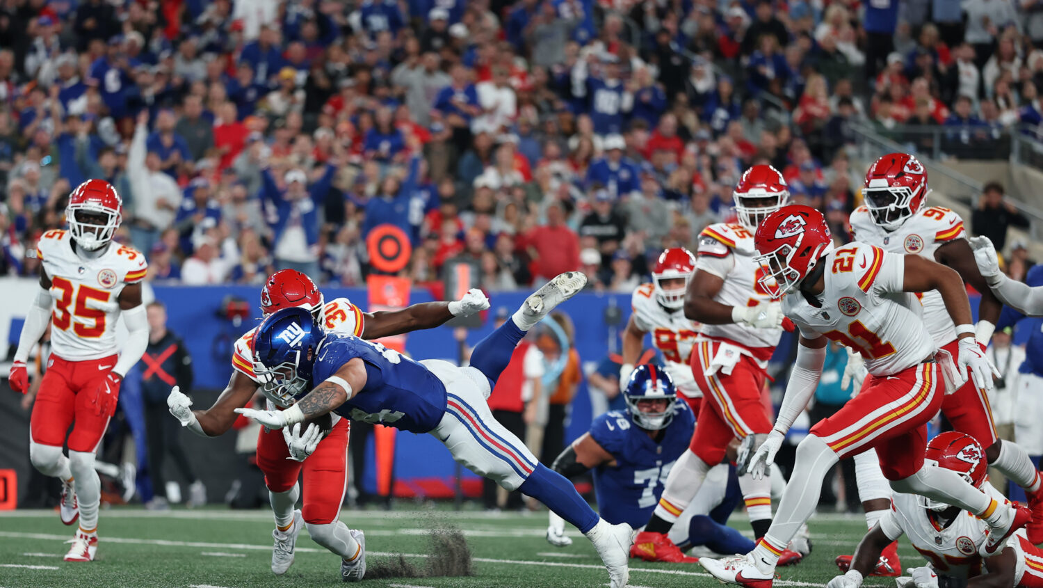 Cam Skattebo #44 of the New York Giants rushes for a touchdown  against the Kansas City Chiefs duri...