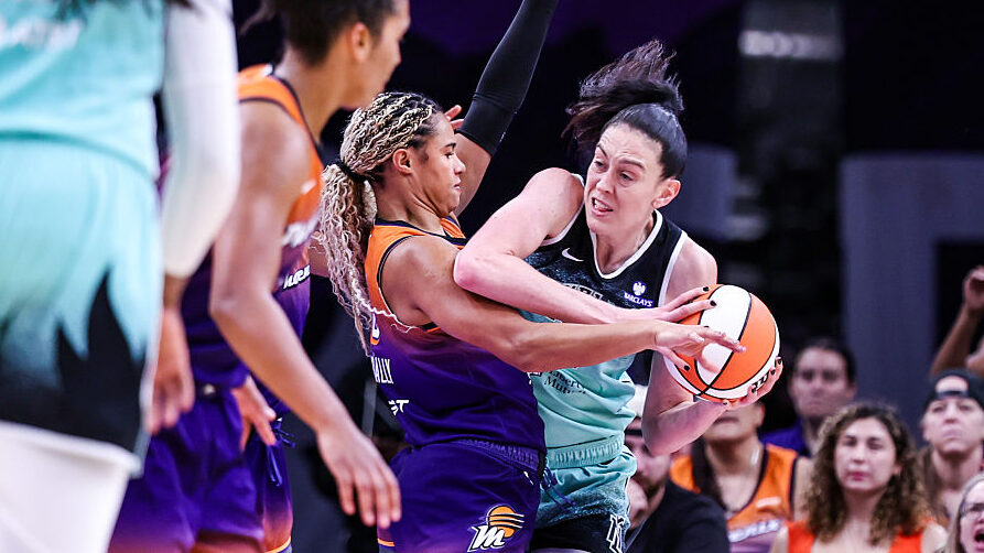 Satou Sabally #0 of the Phoenix Mercury attempts to block a pass made by Breanna Stewart #30 of the...