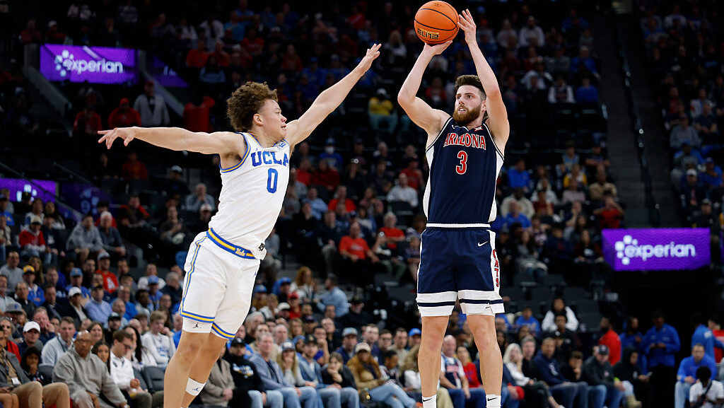 Anthony Dell'Orso #3 of the Arizona Wildcats shoots over Trent Perry #0 of the UCLA Bruins during t...