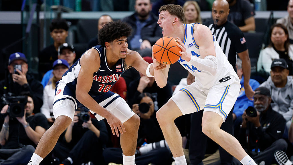 Tyler Bilodeau #34 of the UCLA Bruins reacts as he is fouled by Koa Peat #10 of the Arizona Wildcat...