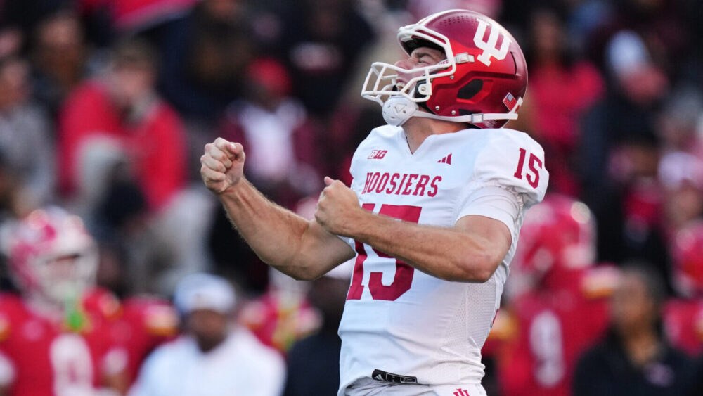 Indiana quarterback Fernando Mendoza (15) celebrates after throwing a touchdown pass to wide receiv...