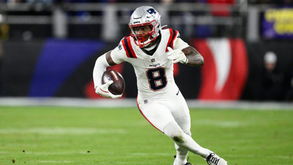 New England Patriots wide receiver Stefon Diggs (8) runs against the Baltimore Ravens during the se...