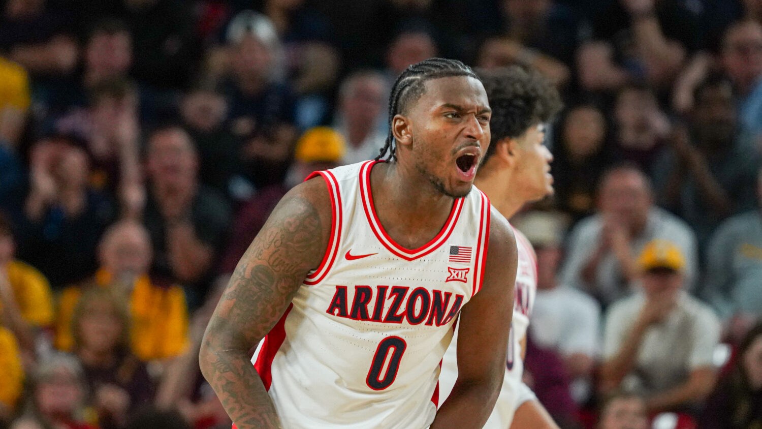 Jaden Bradley celebrates in Arizona's 87-74 win over ASU, improving to 22-0, on Jan. 31, 2026. (Pho...